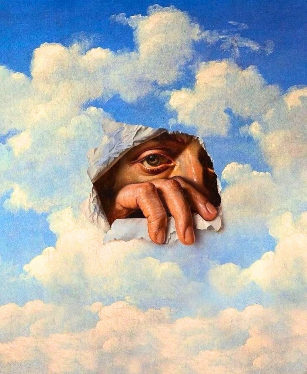 Un ojo y una mano asomándose entre las nubes